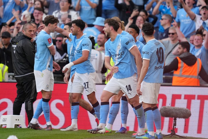 Festejo del Manchester City después de hacerle un gol al Southampton. (AP Photo/Kin Cheung)