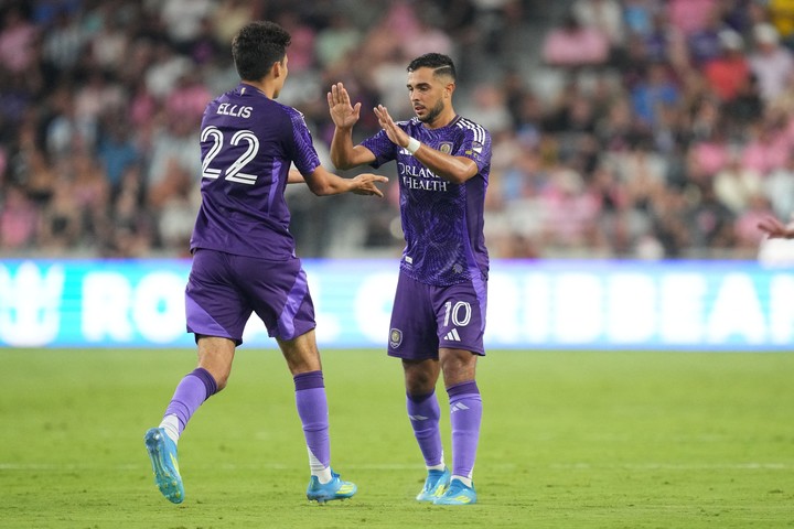 May 2, 2026; Miami, Florida, USA; Orlando City SC midfielder Martín Ojeda (10) celebrates a goal with forward Justin Ellis (22) during the first half against Inter Miami CF at Miami Freedom Park. Mandatory Credit: Jim Rassol-Imagn Images